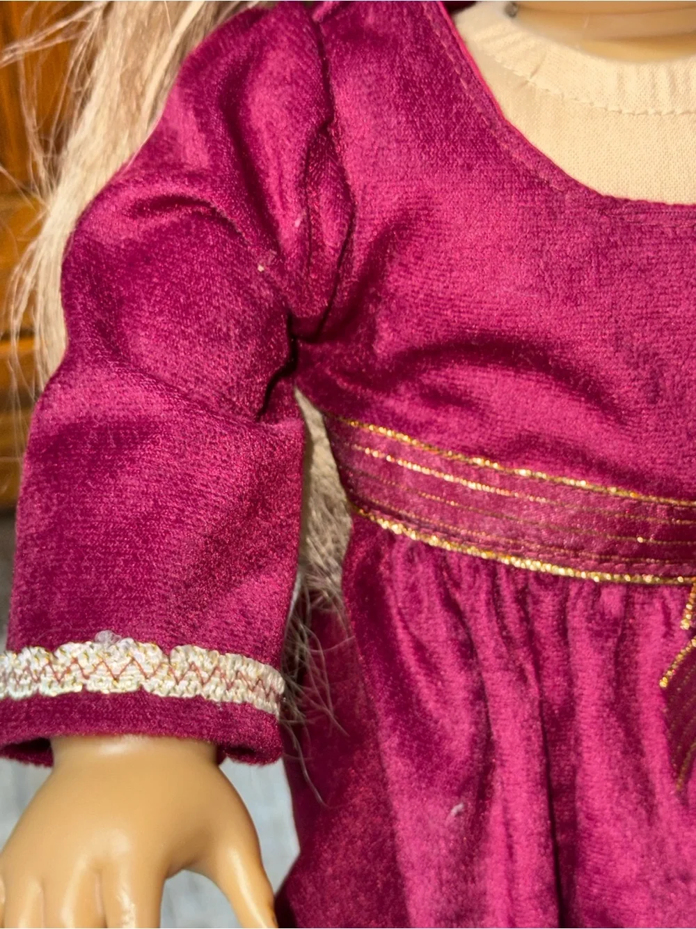 18” doll maroon Velvet dress with gold bow sash around waist